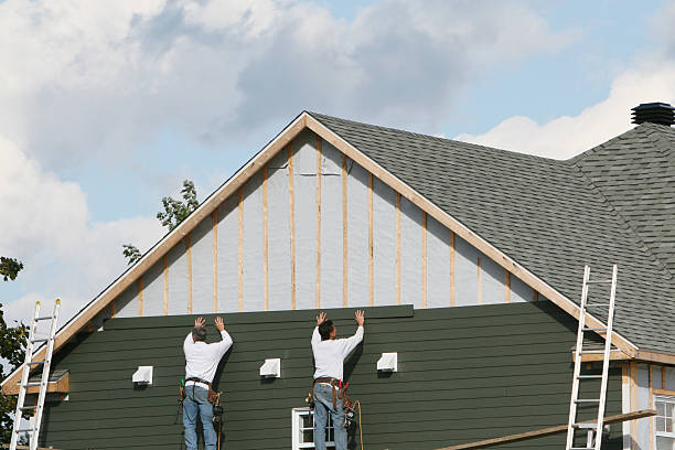 Professional Siding Installation technician working in Fairview, NJ